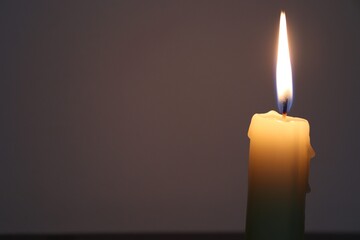 Candle black background of mourning funeral moment of silence	