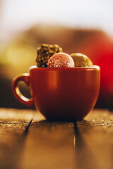 cup of Christmas balls. 