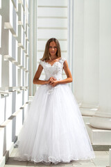 Young beautiful girl in ballroom prom dress