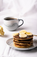 stack of pancakes with coffee