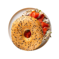 Bagel with cream cheese and smoked salmon. Gourmet sandwich isolated on white background. Top view.