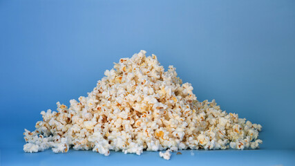 A slide of popcorn on a blue background and a place for an inscription