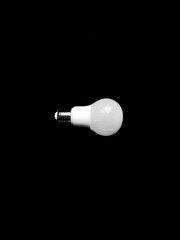 light bulb on black background