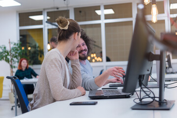 Successful team. Group of young business people working and communicating together in creative office