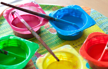 Washable Tempera and rounded paint brushes