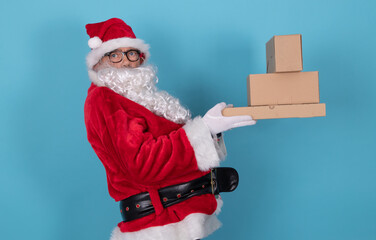 santa claus isolated on background with gift boxes