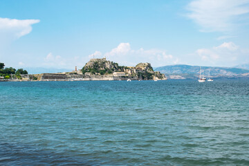 Fototapeta na wymiar A view toward the Old Venetian Fortress in Corfu Town across the Ionian Sea