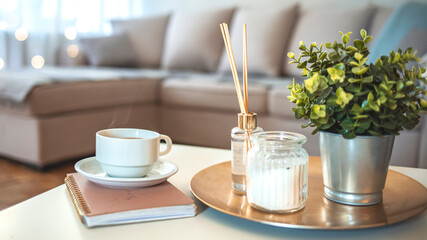 Air freshener, diffuser and aromatherapy concept - aroma bottle for home, European luxury home decor and interior details. Packaging with loft space on a gray background