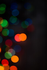 Festive Christmas lights, blurred background for the new year and your holiday. Celebrating the new year or birthday