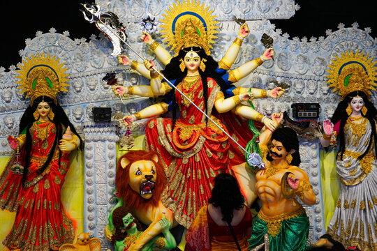 Picture of the great fort festival of Hinduism. The image of the Durga Devi's Family. It is a sculpture made by the artist with clay and straw.