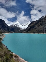 Naklejka na ściany i meble Laguna Paron, Huaraz, Peru. A blue-green lake in the Cordillera Blanca on the Peruvian Andes. At 4185 meters above sea level, it's surrounded by snowy peaks and a pyramid mountain. 