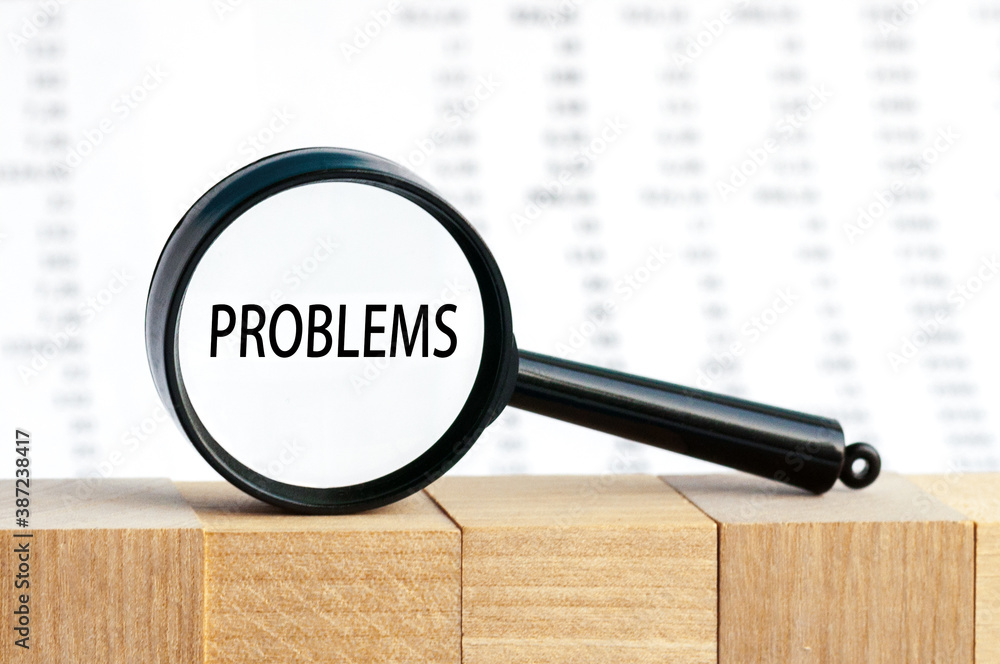 Poster look closely and problems with a magnifying glass , business concept image with soft focus backgroun
