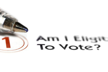 Close up shot of "Am I eligible to text?" on a check list 
