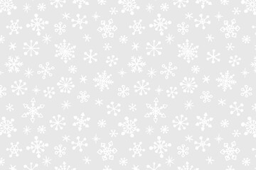 Vector Christmas background with hand drawn snowflakes.