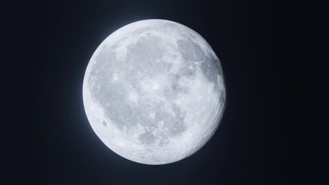 Rotating Moon in different phases with detail surface. Footage of the flight to the Earth's satellite with a copy space and a great transition to black. Functional, Beautiful, Creative video in 4K.