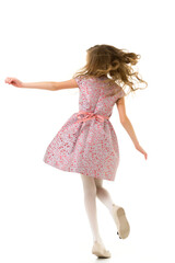 Happy Girl with Long Hair Wearing Pink Dress Having Fun