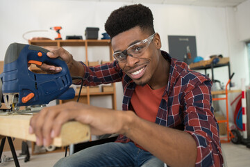 disabled man carpenter in the workplace
