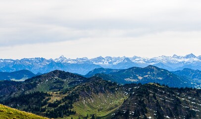View from Hochgrat mountain nearby Oberstaufen (Bavaria, Bayern, Germany) on alps mountains in Tyrol, Vorarlberg. Hochvogel, big, Grosser Klottenkopf, Austria. Good hiking way