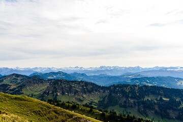 Fototapeta premium View from Hochgrat mountain nearby Oberstaufen (Bavaria, Bayern, Germany) on alps mountains in Tyrol, Vorarlberg. Hochvogel, big, Grosser Klottenkopf, Austria. Good hiking way