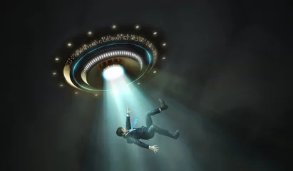 Abwaschbare Fototapete UFO Entführungskonzept durch Außerirdische. Junger Mann wird von UFO entführt.