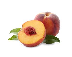Whole and cut ripe peaches with leaves isolated on white