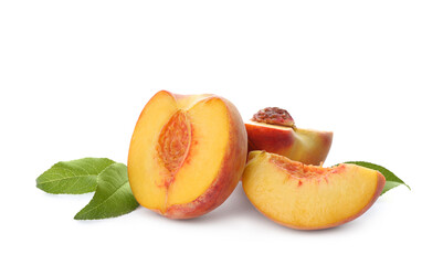 Cut fresh ripe peaches with leaves on white background