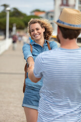 Obraz premium portrait of smiling beautiful girl and her handsome boyfriend