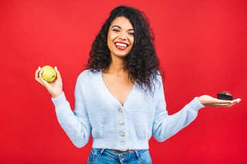 American african girl does not eat cake. Conception to lose weight. Hand gesturing no to a cake....