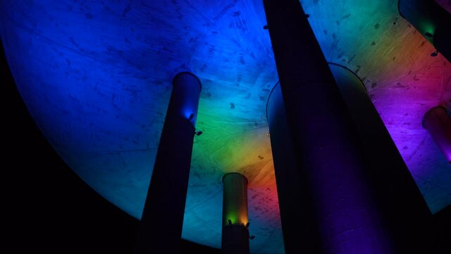 Espoo, Finland - October 20, 2020: Colorful light show on old water tower at Haukilahti, that is transformed to be used as restaurant