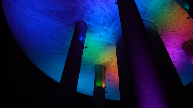 Espoo, Finland - October 20, 2020: Colorful light show on old water tower at Haukilahti, that is transformed to be used as restaurant