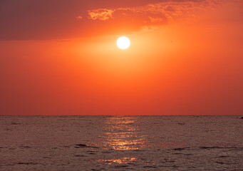 big sun over sea sunrise