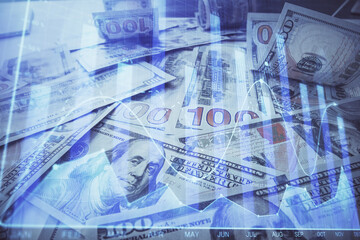 Multi exposure of forex chart drawing over us dollars bill background. Concept of financial success markets.