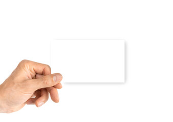 Card isolated. Hand holding blank business paper card isolated on white background. Empty credit template in person arm.