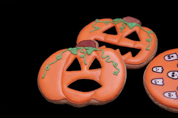Halloween gingerbread on black background. 