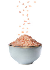 Fototapeta na wymiar Pink himalayan salt falling into bowl on white background