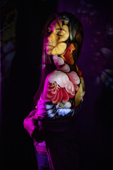 Abstract photography in the style of light painting. girl on a black background	
