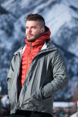 Handsome Caucasian man in winter jacket