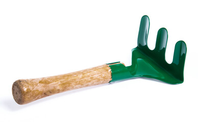 green fork garden tools isolated on white background