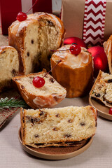 .Delicious Christmas dessert, mini panettone and homemade chocotone with fruits, nuts and chocolate