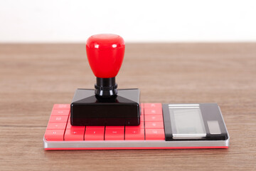 The official seal is on the calculator
