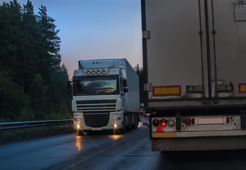 Freight traffic on suburban highway at night
