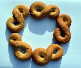 
fresh pastries laid out in a circle lie on the table