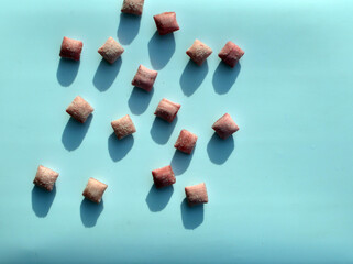 
sweet candies in the form of squares lie on the table
