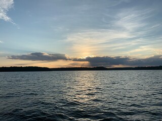 Obraz premium Sunset Cruise On The Lake