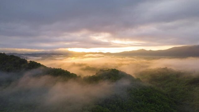 Hyper lapse video 4k, Aerial view Beautiful of morning scenery Golden light sunrise And the mist flows on high mountains