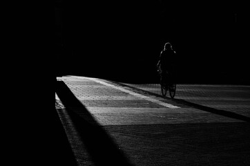 silhouette of a person on the street