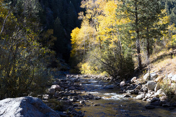 Pecos River in autumn in the Santa Fe National Forest of New Mexico is a great place to hike along...