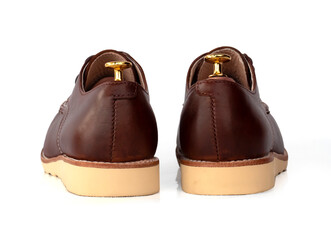 Men fashion brown shoes leather with shoe tree (shape supporter)  isolated on white background. back view