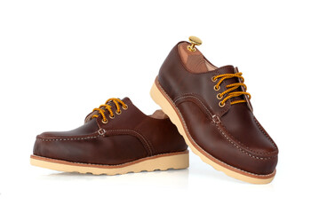 Men fashion brown shoes leather  with shoe tree (shape supporter) isolate on white background.