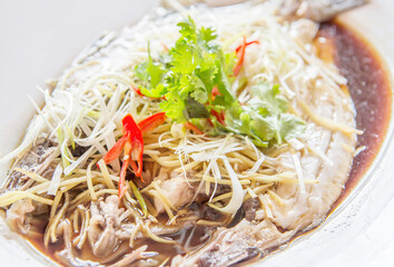 Steamed pomfret with soy sauce